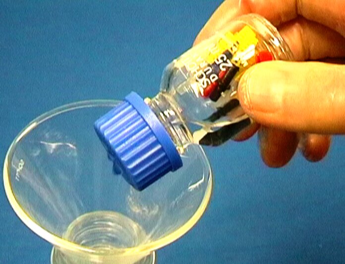 Draining liquid through a perforate cap